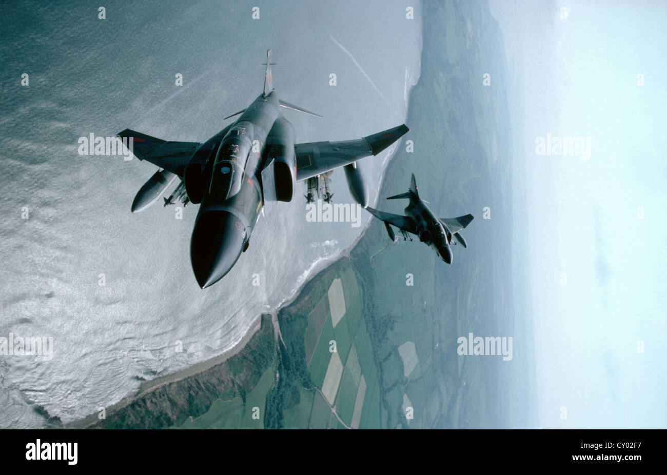 RAF Phantom flying above coast Stock Photo