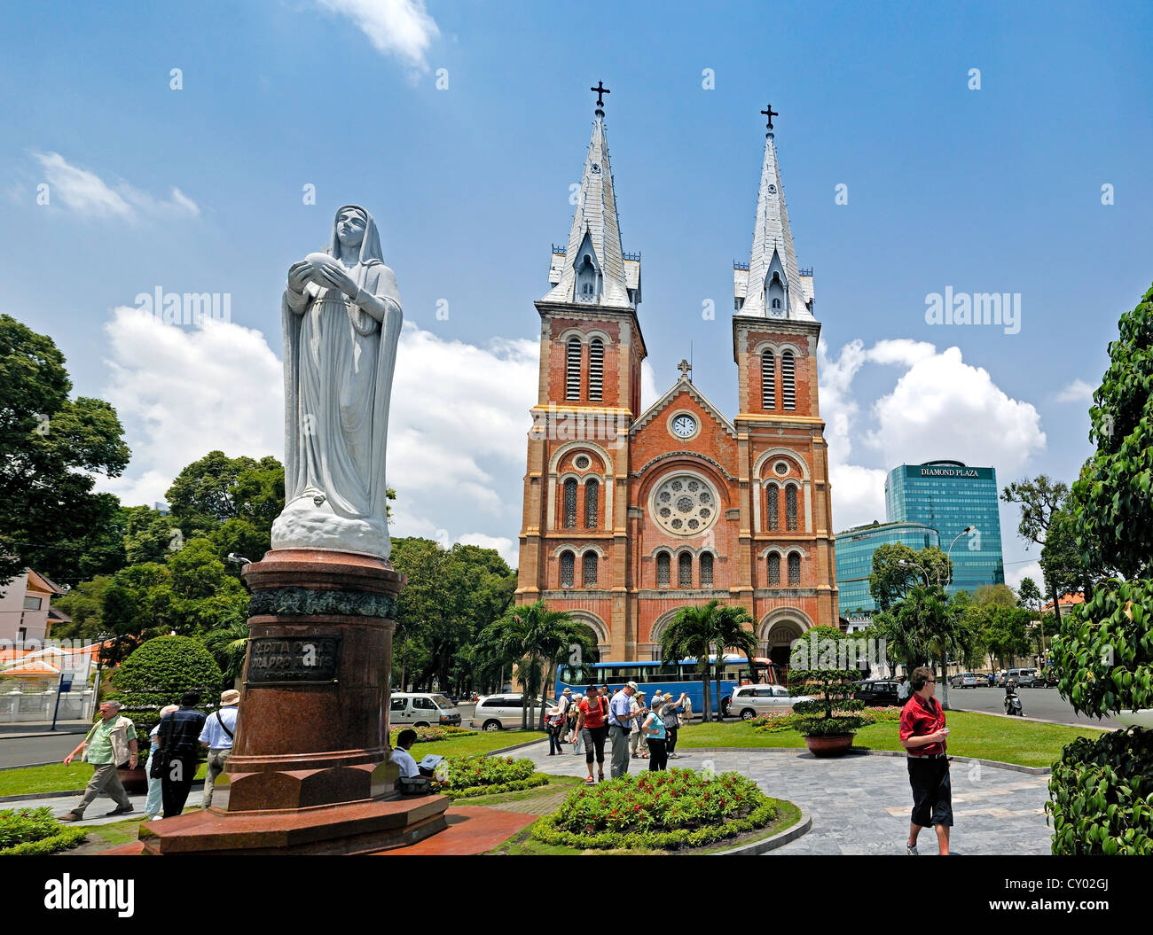 Catholic Cathedral of Notre Dame, Nha Tho Duc Ba, Church of Our Lady, with a statue of Mary, with Diamond Plaza shopping centre Stock Photo