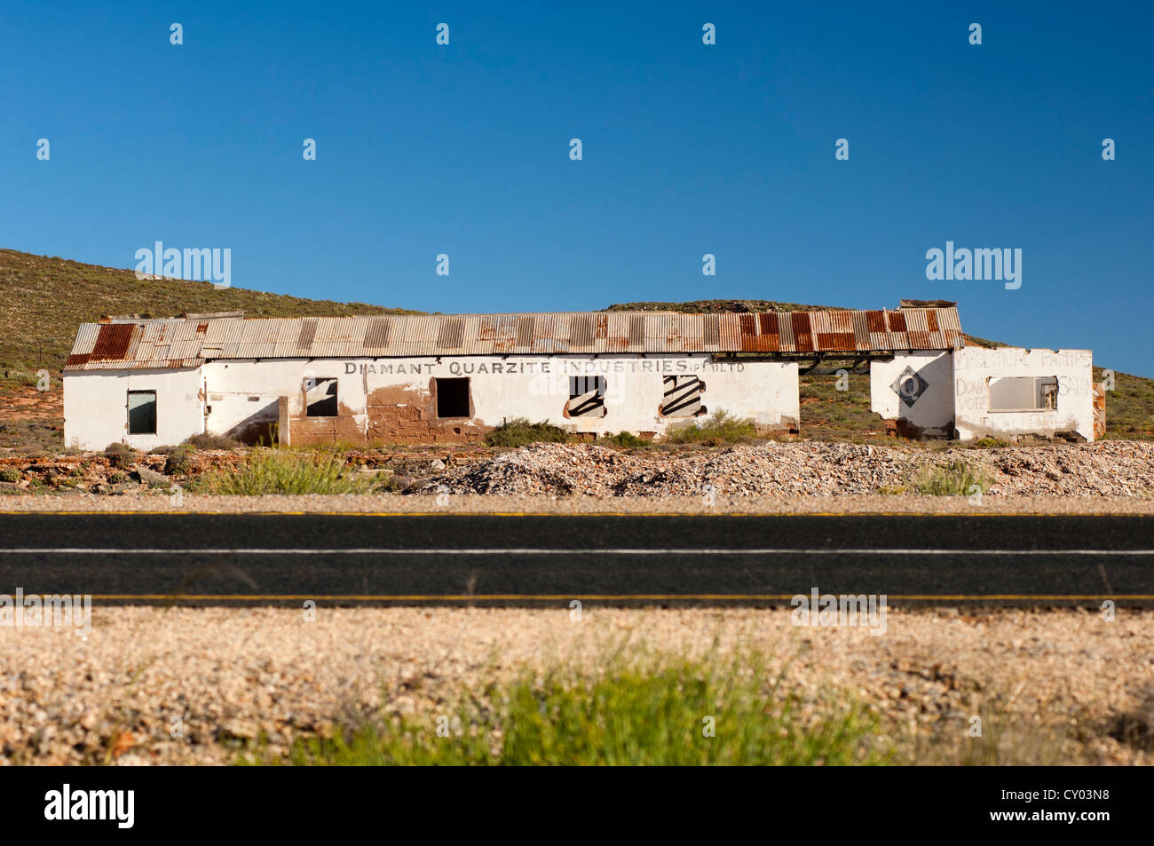Dilapidated office buildings of the Diamond Quarzite Industries Ltd., National Road 7, Northern Cape province, South Africa Stock Photo