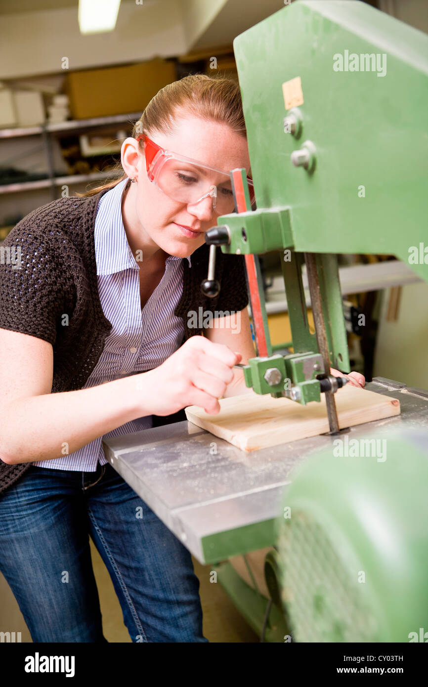 Young female teacher in the handwork classroom Stock Photo