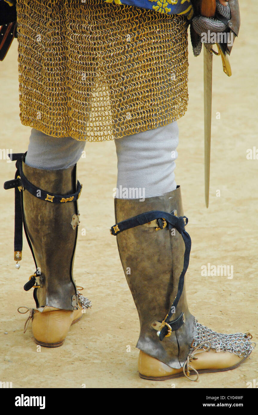 Boots and chain mail, detail view, people in medieval costumes representing  their respective districts at the Palio Stock Photo - Alamy