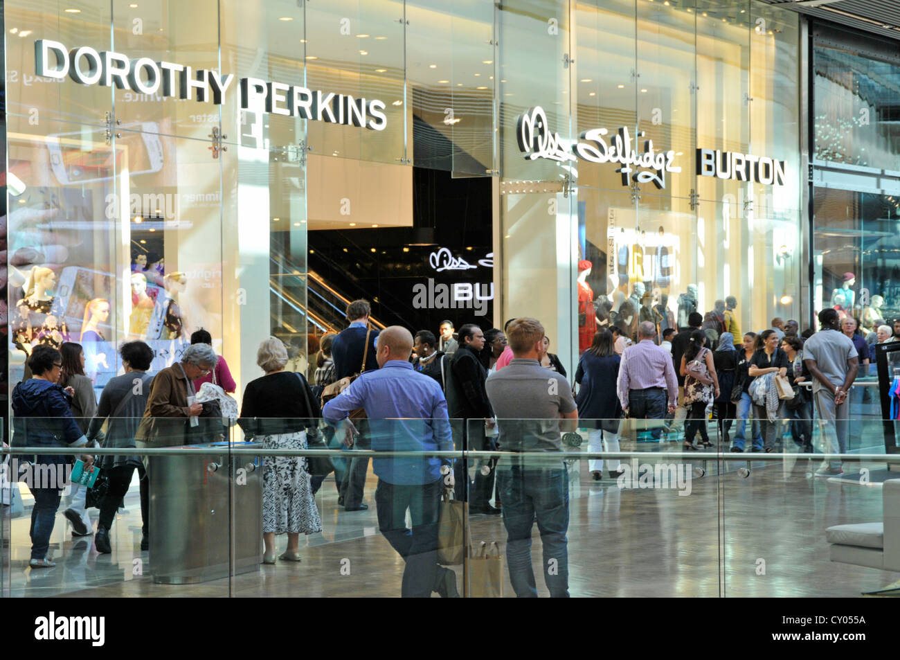 Adjacent shop fronts of Dorothy Perkins Miss Selfridge & Burton stores  all brands of the Arcadia Group in indoor shopping mall Stock Photo