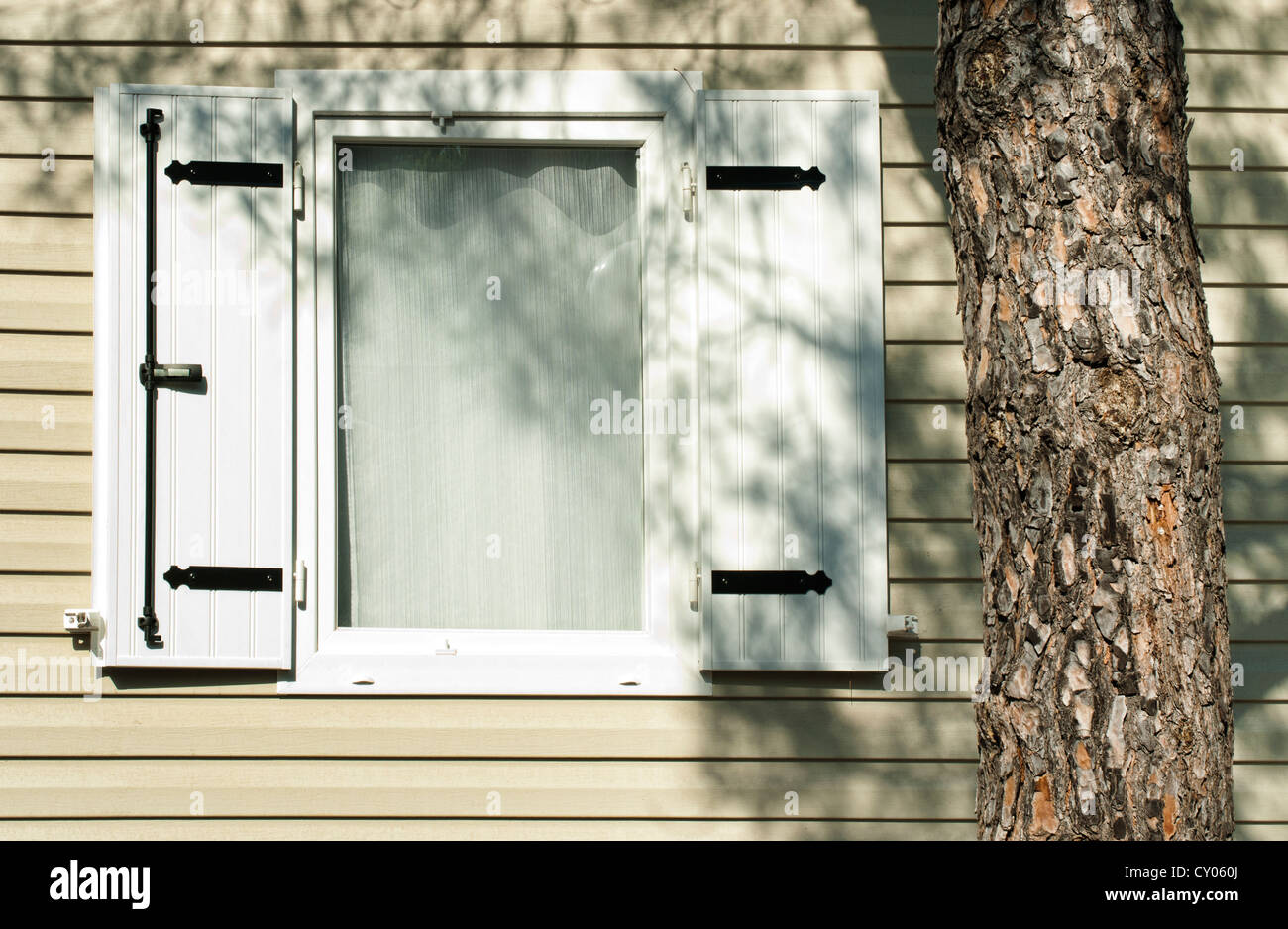 Window with wooden shutters Stock Photo - Alamy