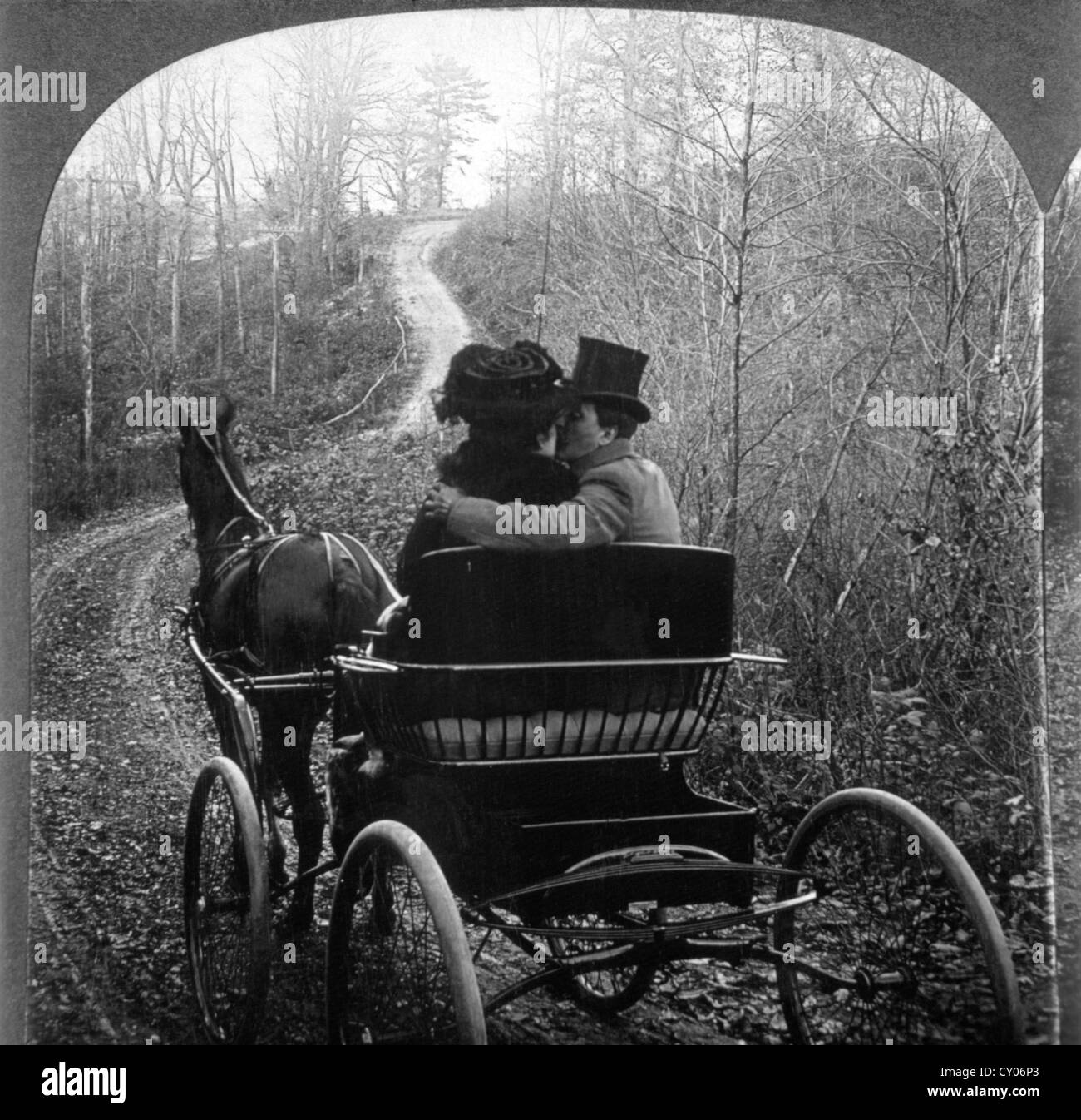 Man and Woman in a Horse Drawn Carriage, Rear View, Stereo Photograph, Circa 1901 Stock Photo