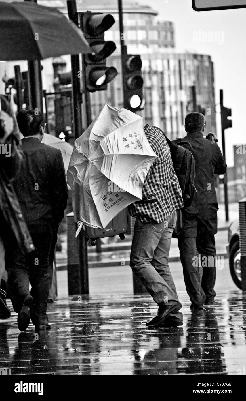 Windy umbrella Black and White Stock Photos & Images Alamy