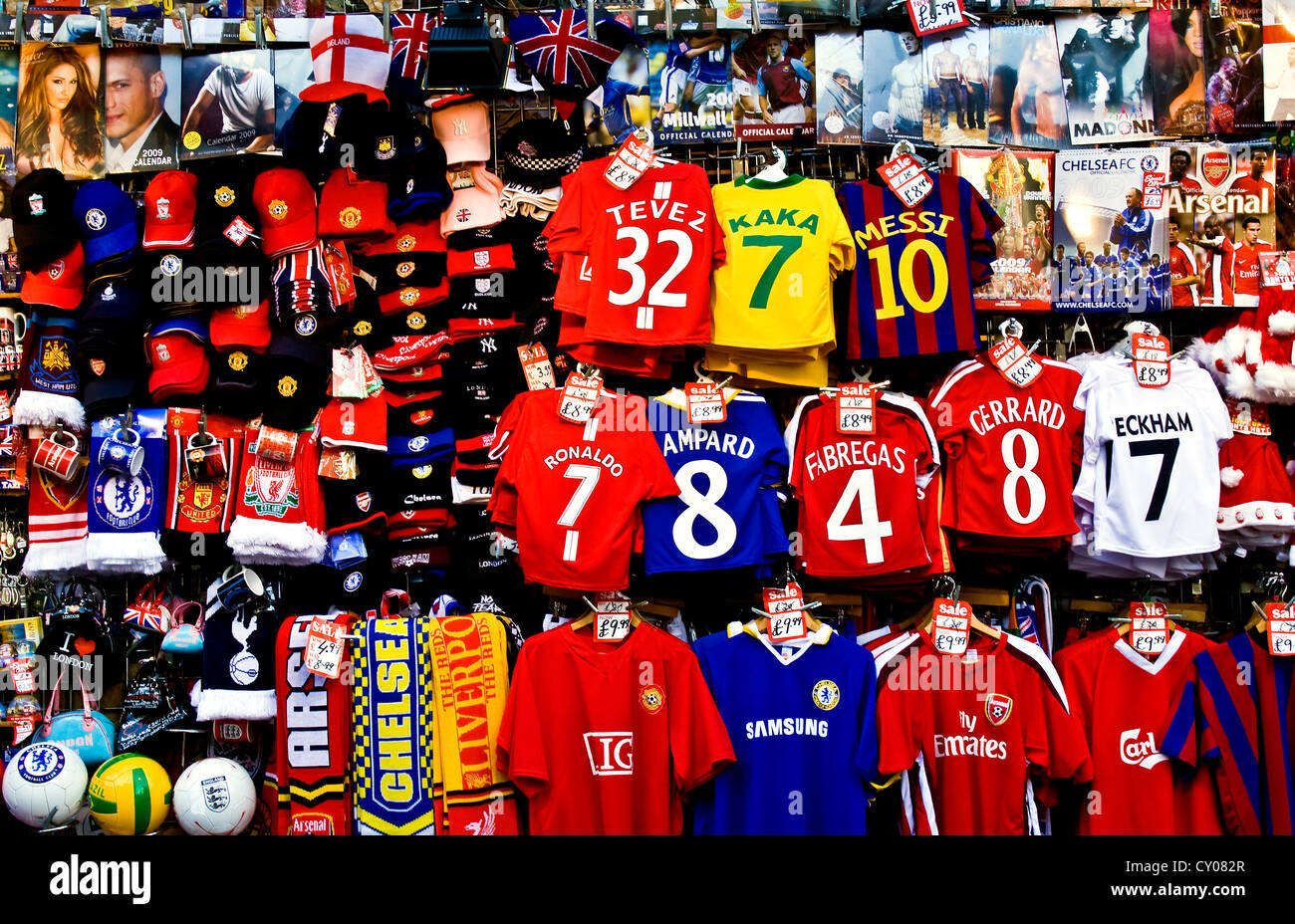 variety of football uniforms on sale in a street stall in Oxford Street