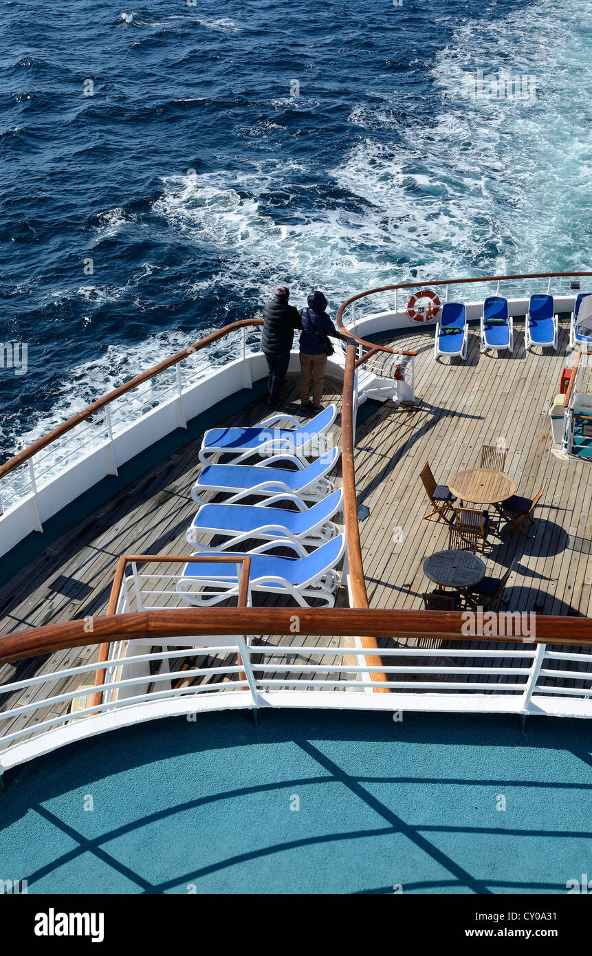 CRUISE SHIP AT SEA WITH PASSENGERS ON DECK Stock Photo - Alamy