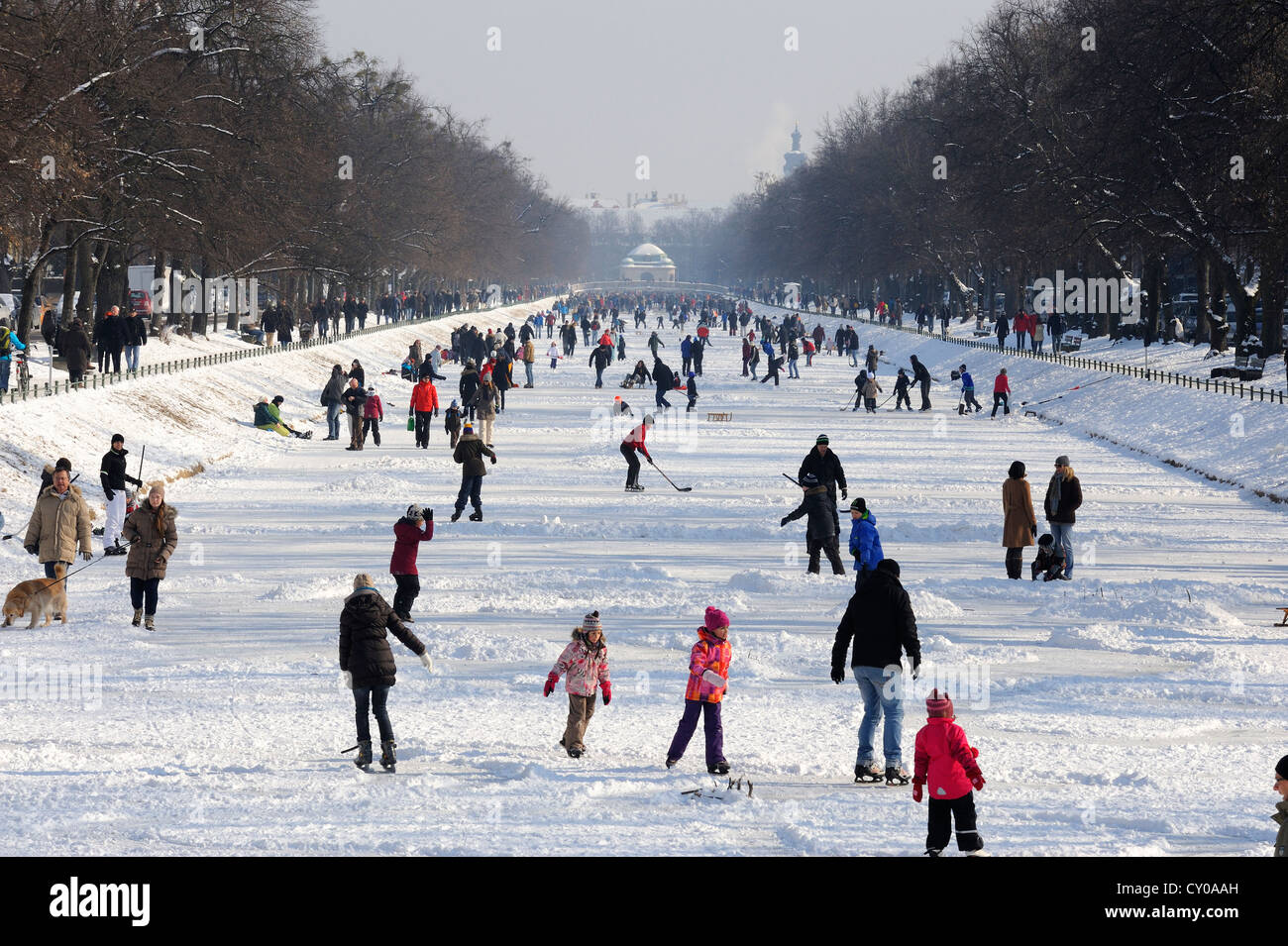 Ice skaters on the frozen canal, Nymphenburg Palace, Munich, Upper Bavaria, Bavaria, PublicGround Stock Photo