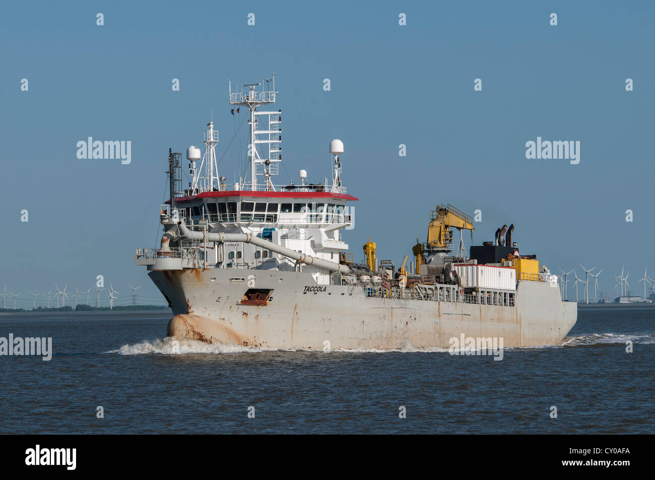 Dredger, 'Taccola' working boat on Dollart bay, estuary near Emden, Lower Saxony Stock Photo