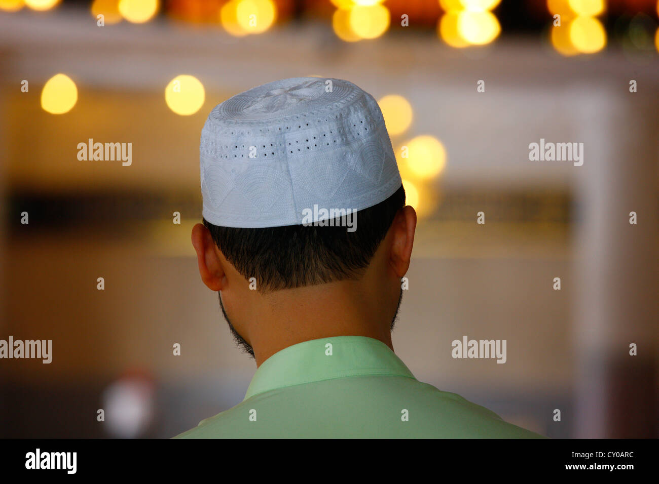 Muslim man, rear view, National Mosque, Kuala Lumpur, Malaysia, Southeast Asia, Asia Stock Photo