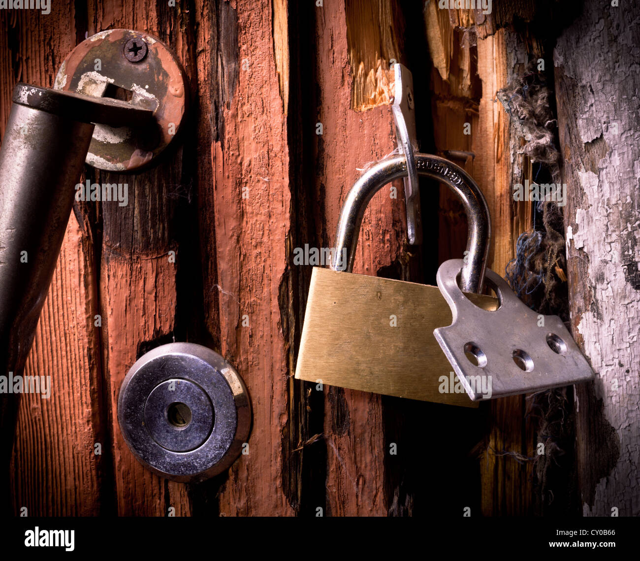Broken padlock on a door Stock Photo Alamy