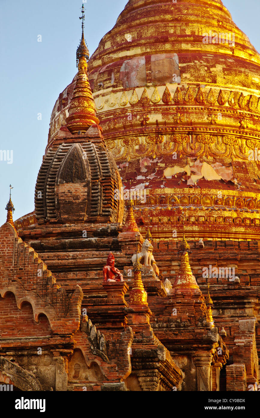 The DHAMMAYAZIKA PAGODA is gilded and bell shaped completed in 1196 AD by Narapatisithu - BAGAN, MYANMAR Stock Photo