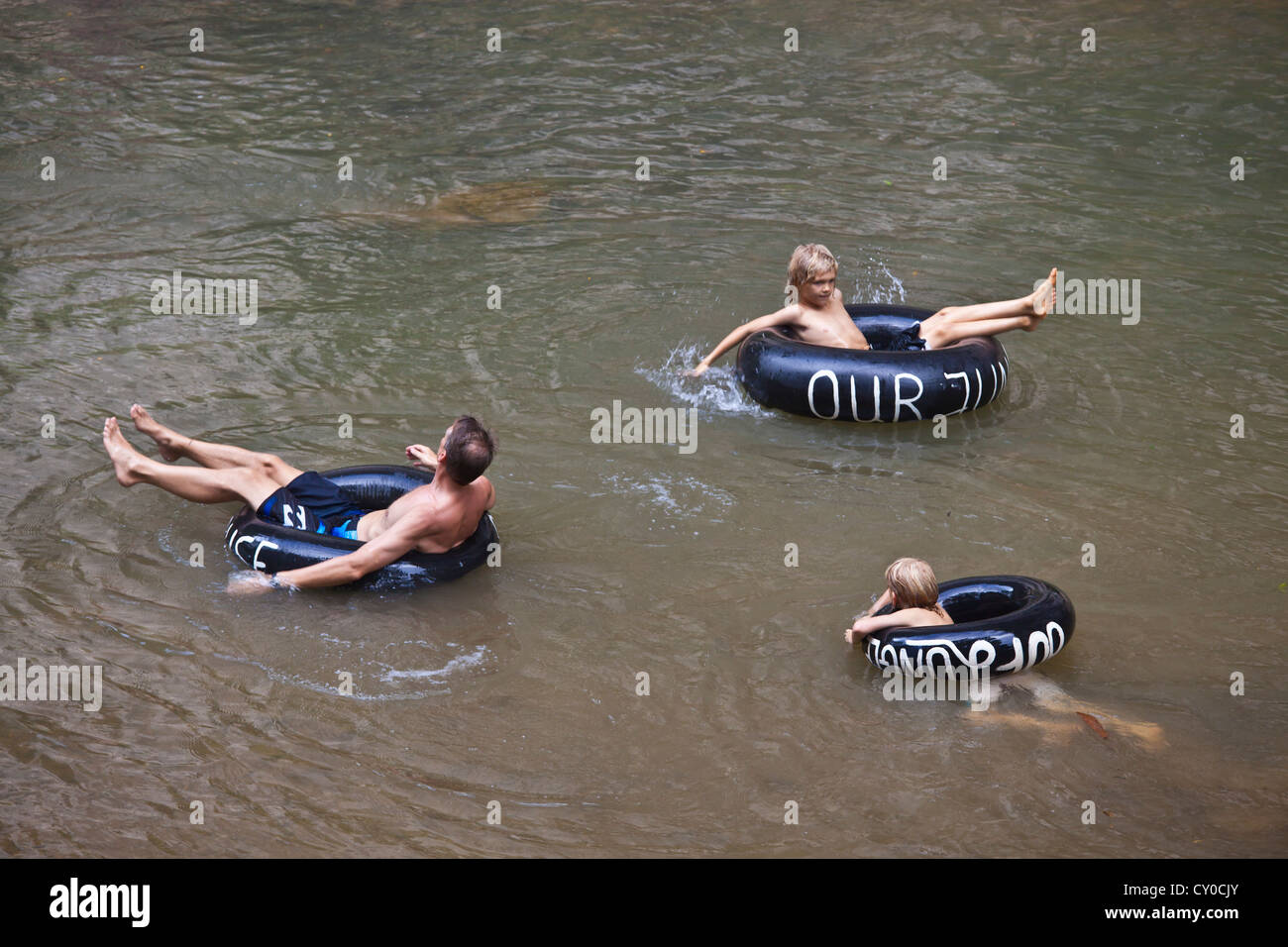 Tubing in the river next to OUR JUNGLE HOUSE a lodge near KHAO SOK NATIONAL PARK - SURATHANI PROVENCE, THAILAND Stock Photo