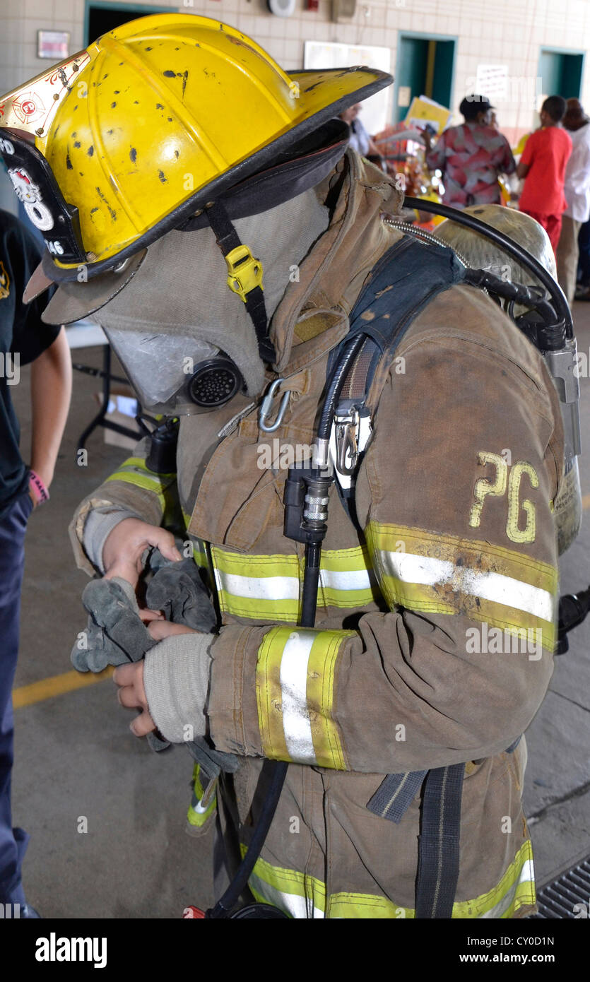 Firefighter in full  turnout gear Stock Photo