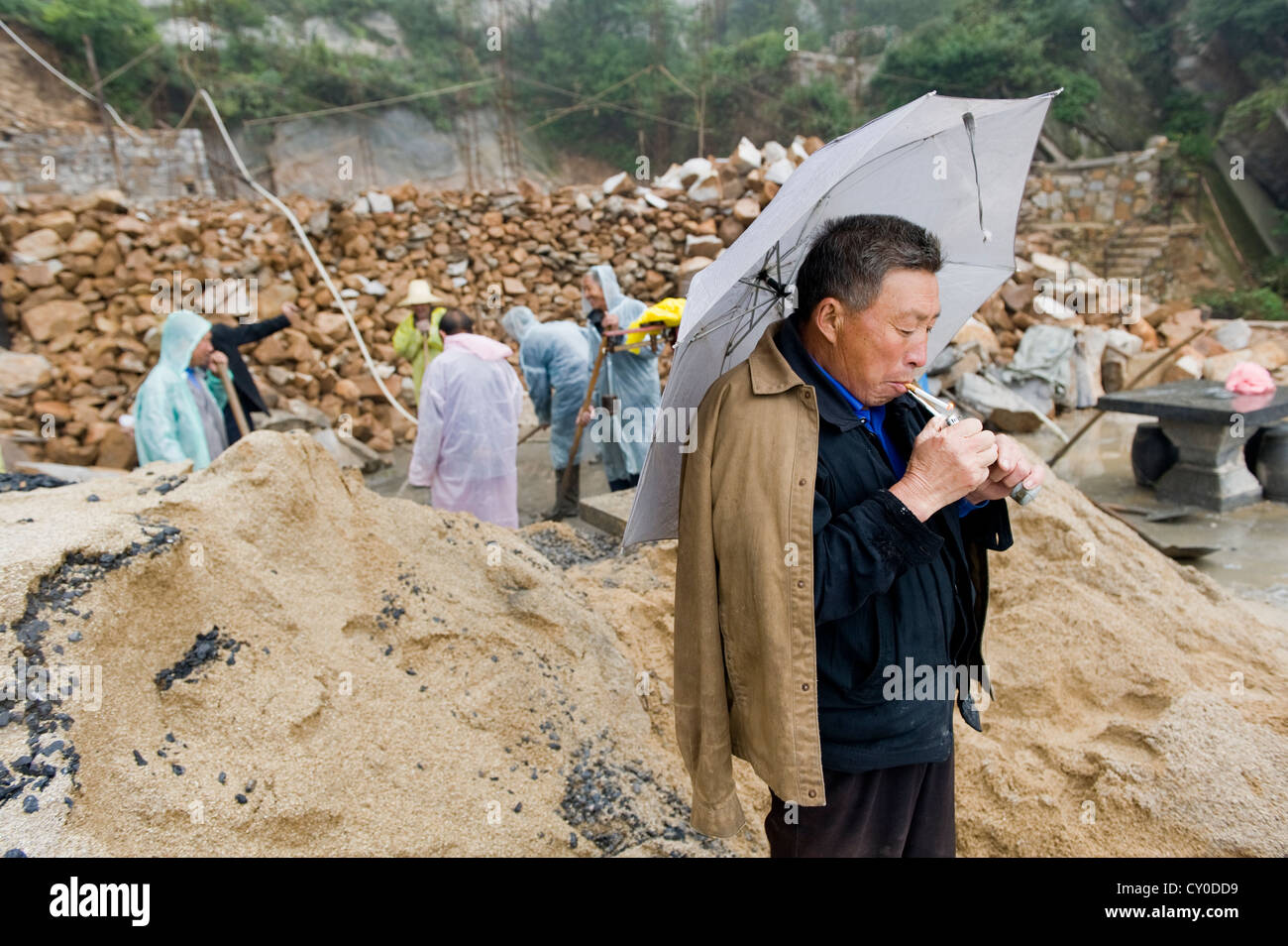 Umbrella cigarette hires stock photography and images Alamy