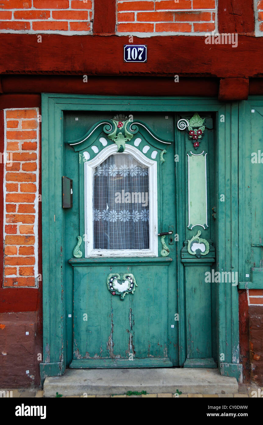 Decorative front door of an old half-timbered house, Elbstrasse Street, Lauenburg, Schleswig-Holstein Stock Photo