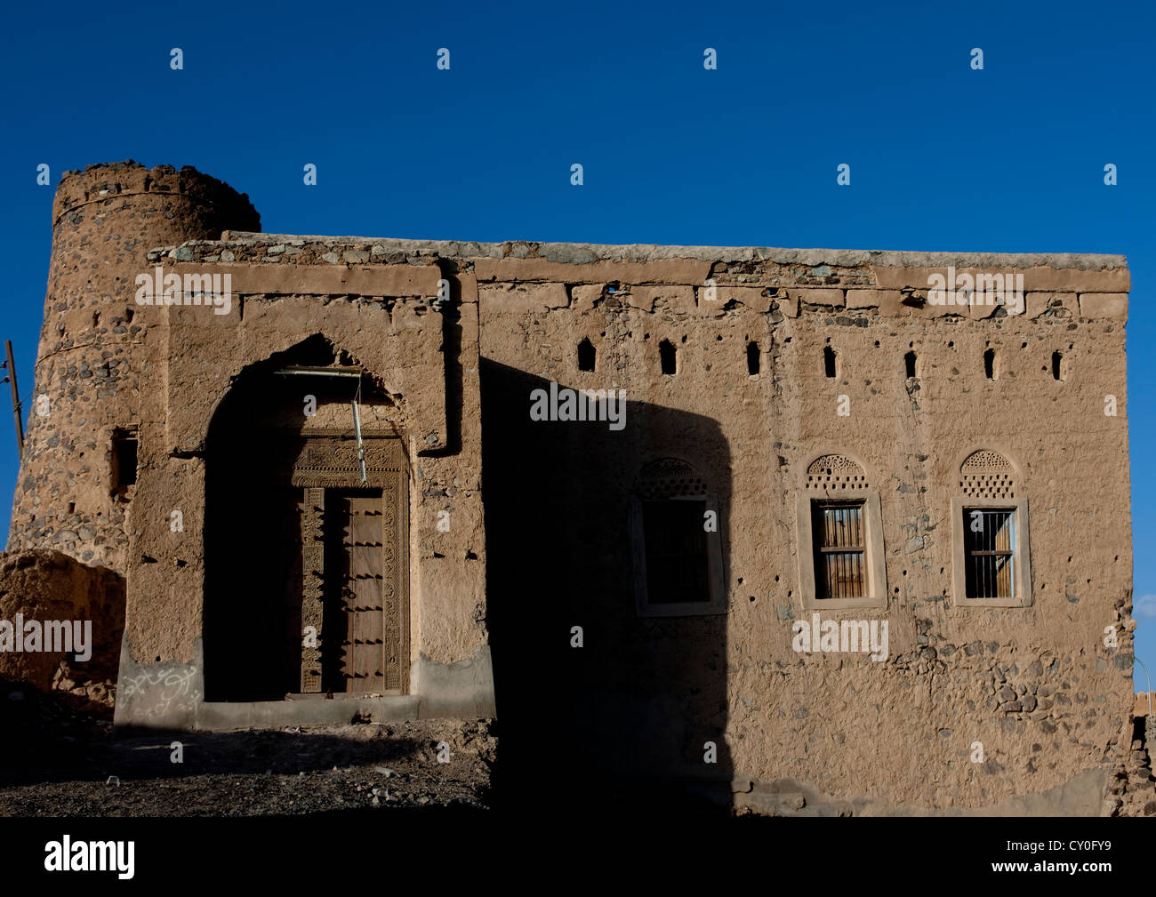 Old Omani House With Wooden Carved Door, Birkat Al Mauz, Oman Stock