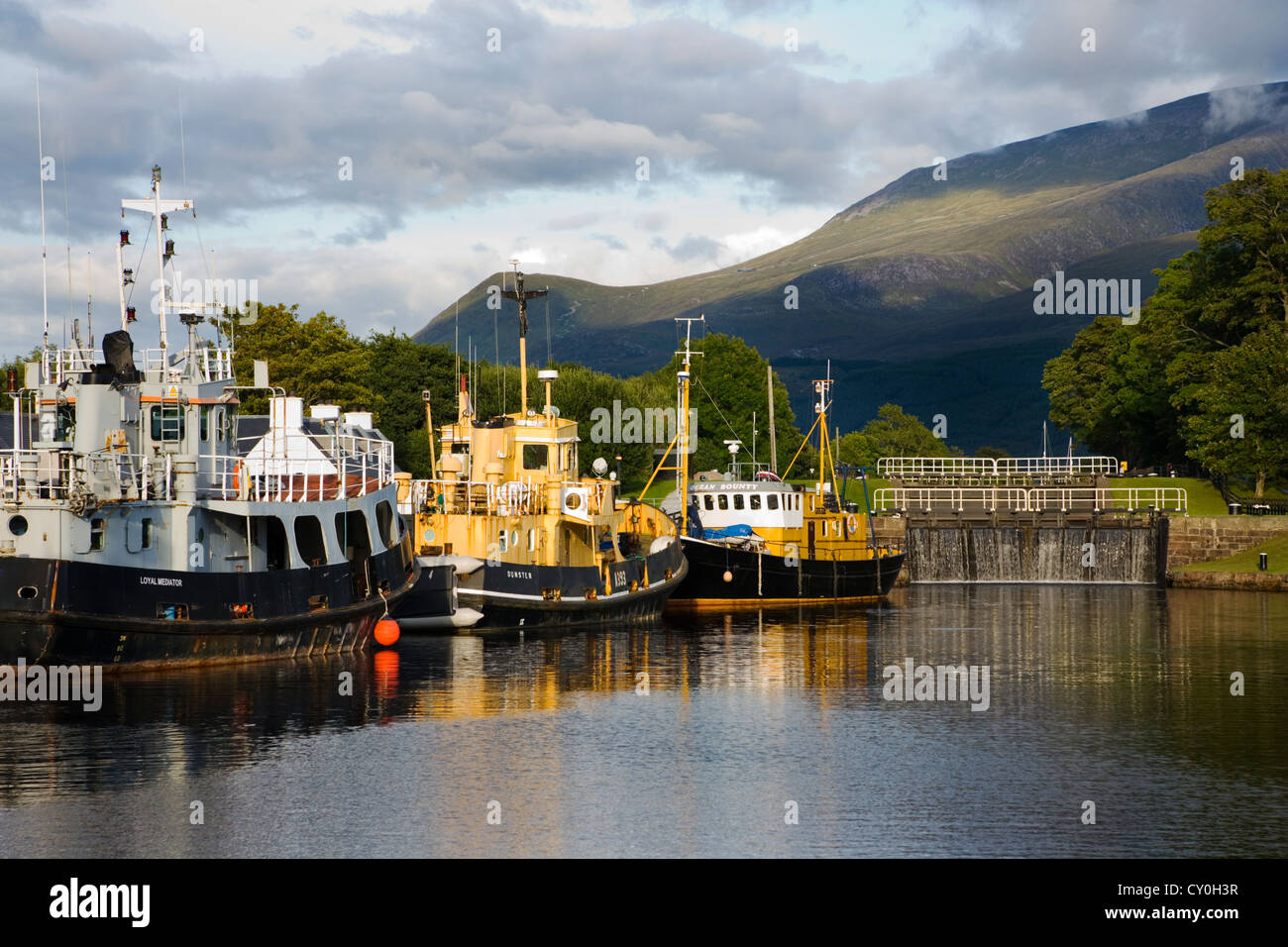 Boats moored on the Caledonian Canal at Corpach near Fort William in Inverness-shire;Scotland Stock Photo