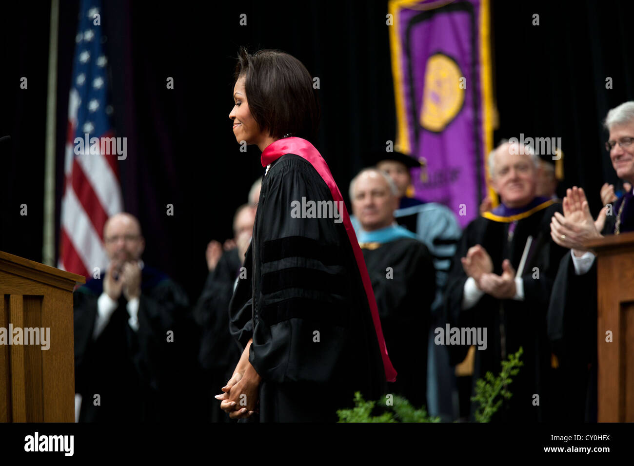 First Lady Michelle Obama receives applause following her commencement address to the 2011 graduating class at the University of Northern Iowa May 7, 2011 in Cedar Falls, Iowa. Stock Photo