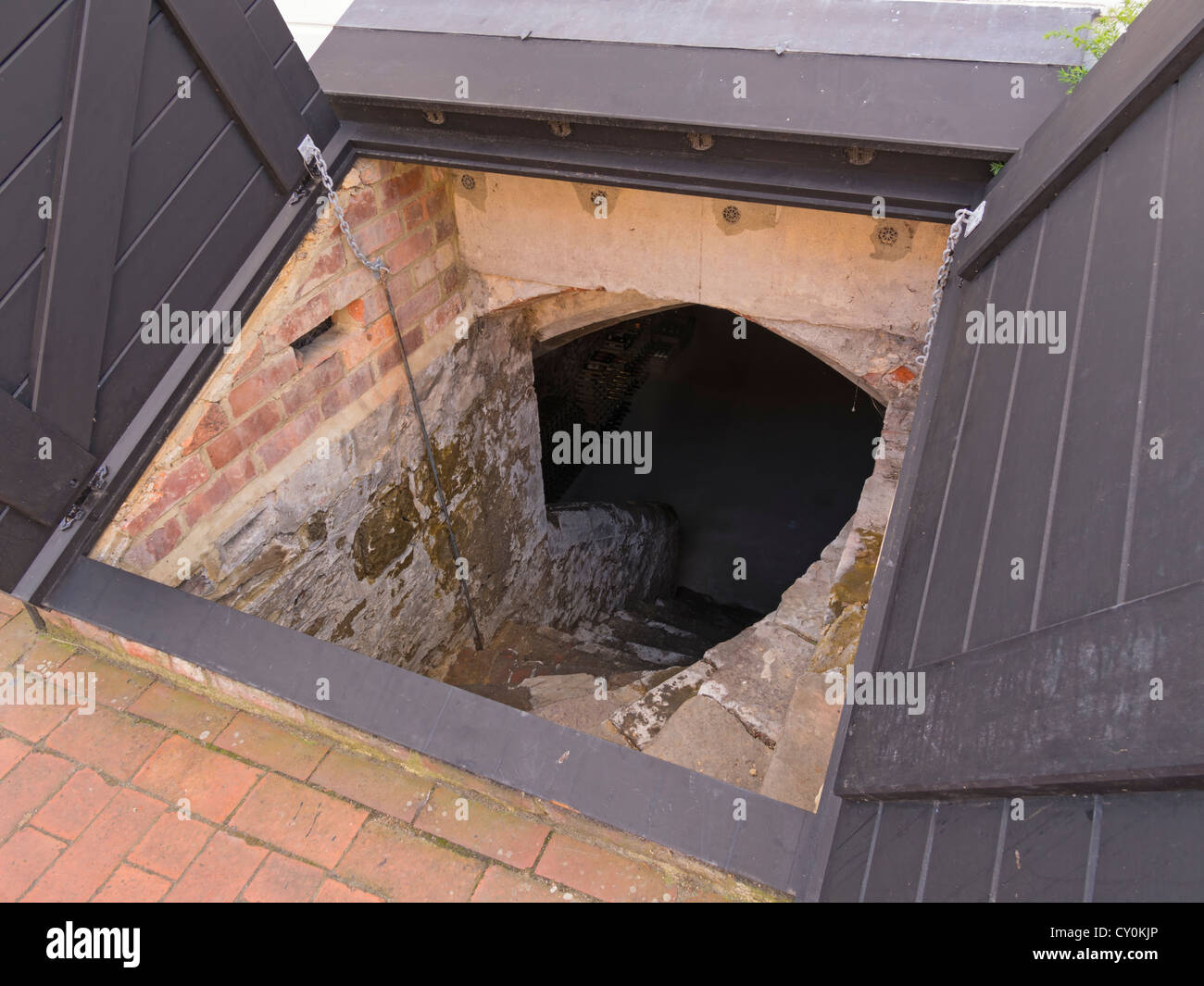 Door to a cellar in Winchelsea, Sussex. Stock Photo