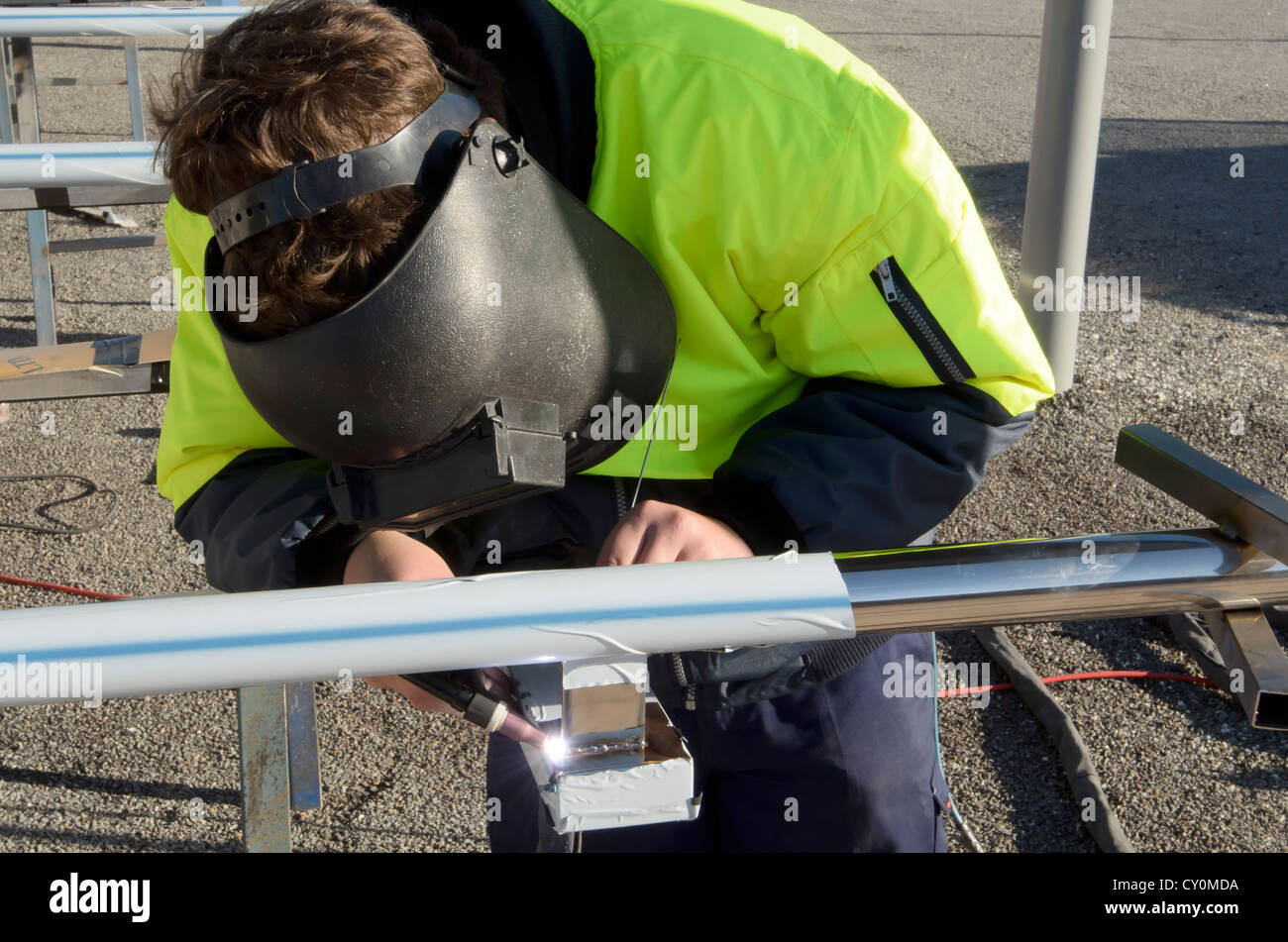 Person welding Stainless steel Stock Photo