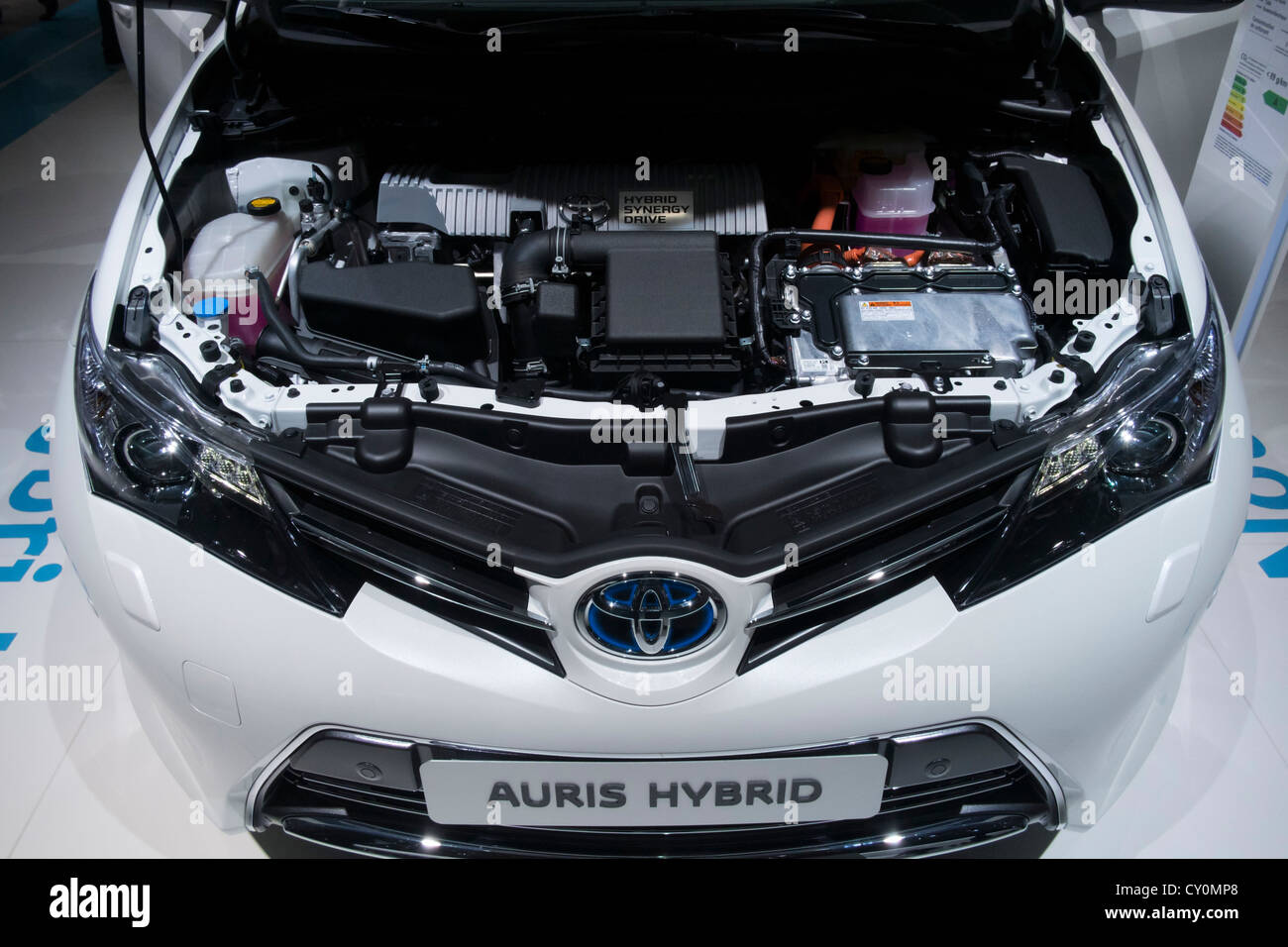 Detail of engine in   new toyota Auris hybrid compact car at Paris Motor Show 2012 Stock Photo