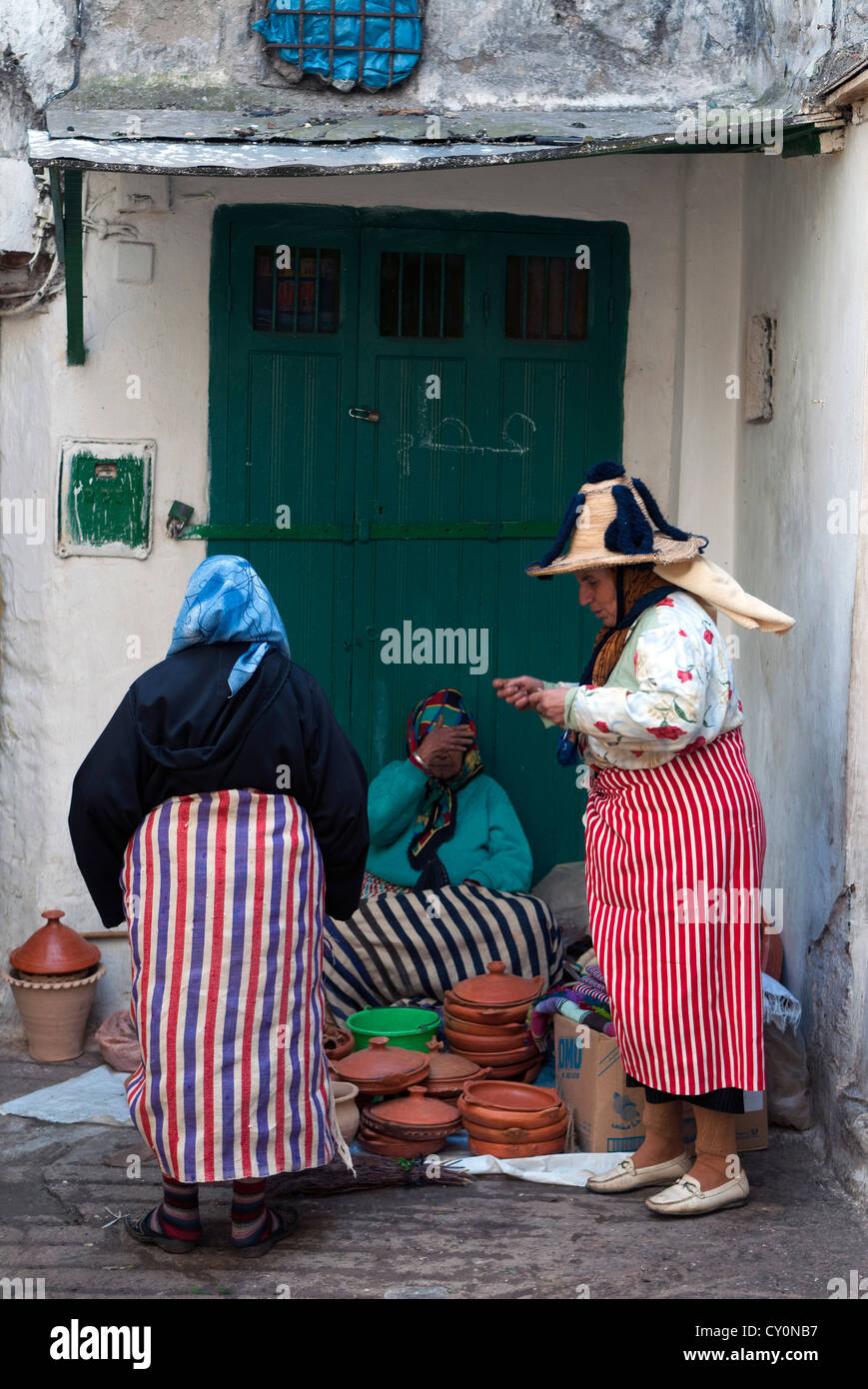 Women selling pottery, Medina, Tetouan, UNESCO World Heritage Site, Morocco, North Africa, Africa Stock Photo