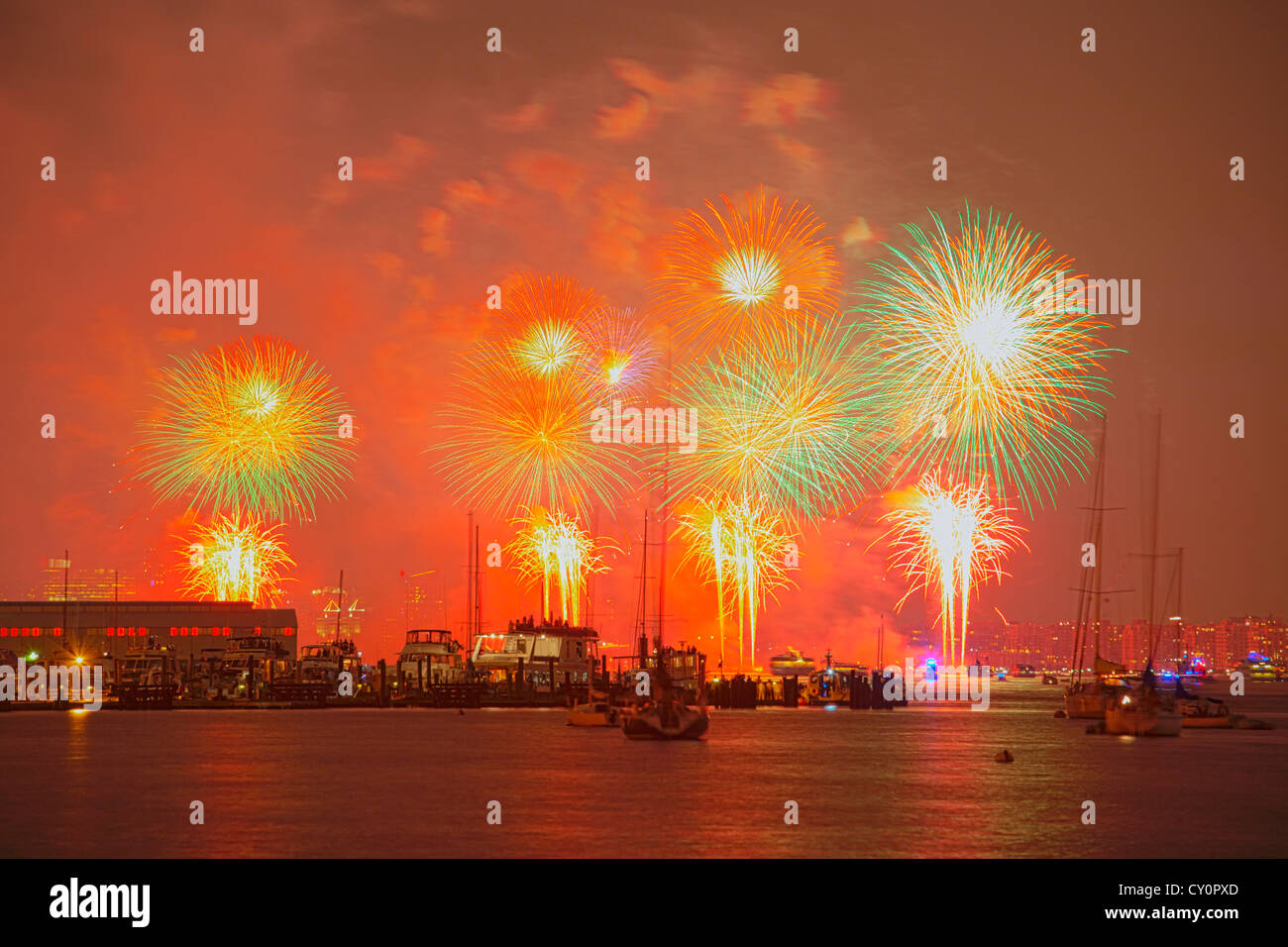 Macy's 4th of July Fireworks display lights up the sky over the Hudson River seen from the Upper Westside, New York, USA Stock Photo