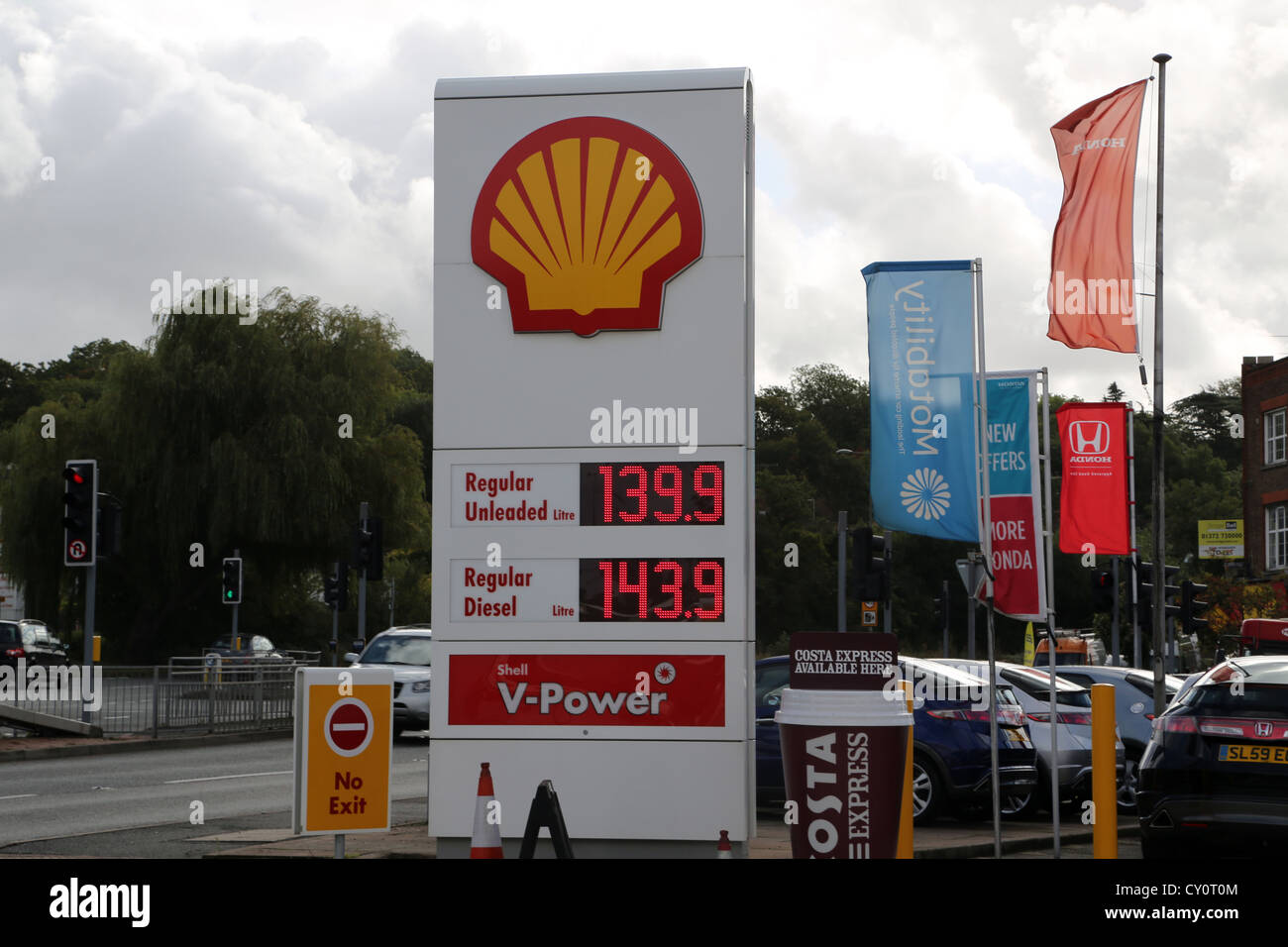 Shell Petrol Station Sign V-Power Regular Unleaded And Regular Diesel Prices Ewell England Stock Photo
