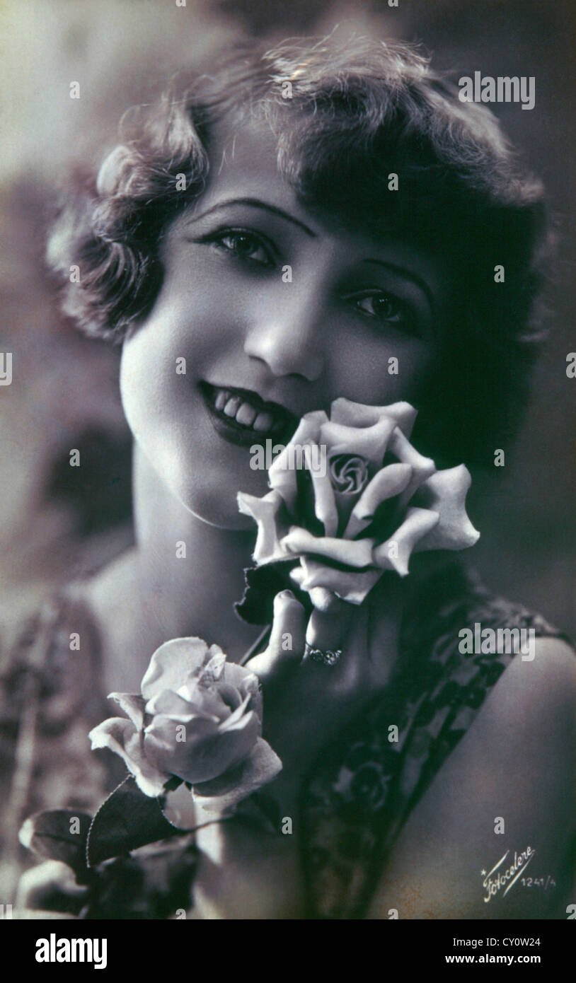 Smiling Woman with Roses, Portrait, Circa 1910 Stock Photo