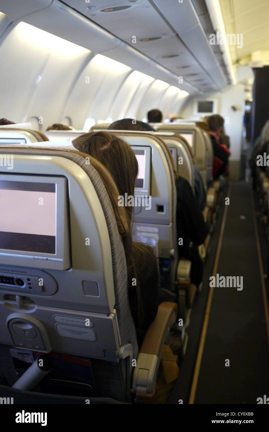 row of seats on board airplane Stock Photo Alamy