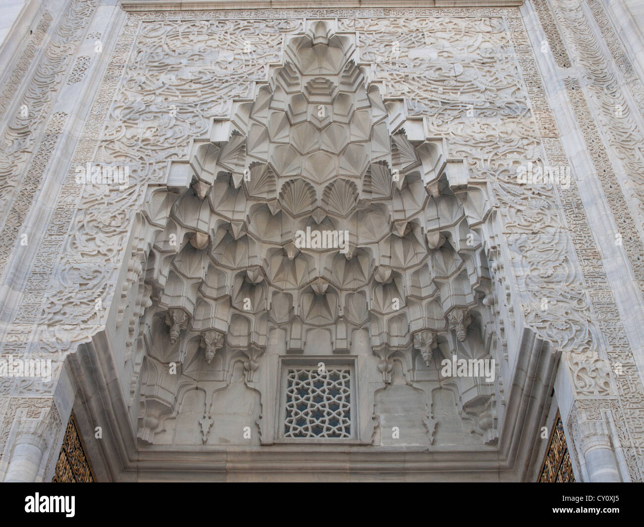 The green mosque in Bursa Turkey, Yesil Cami, Unesco World Heritage Site  with marble carvings outside. Marble mocárabe half-dome above the entrance  Stock Photo - Alamy