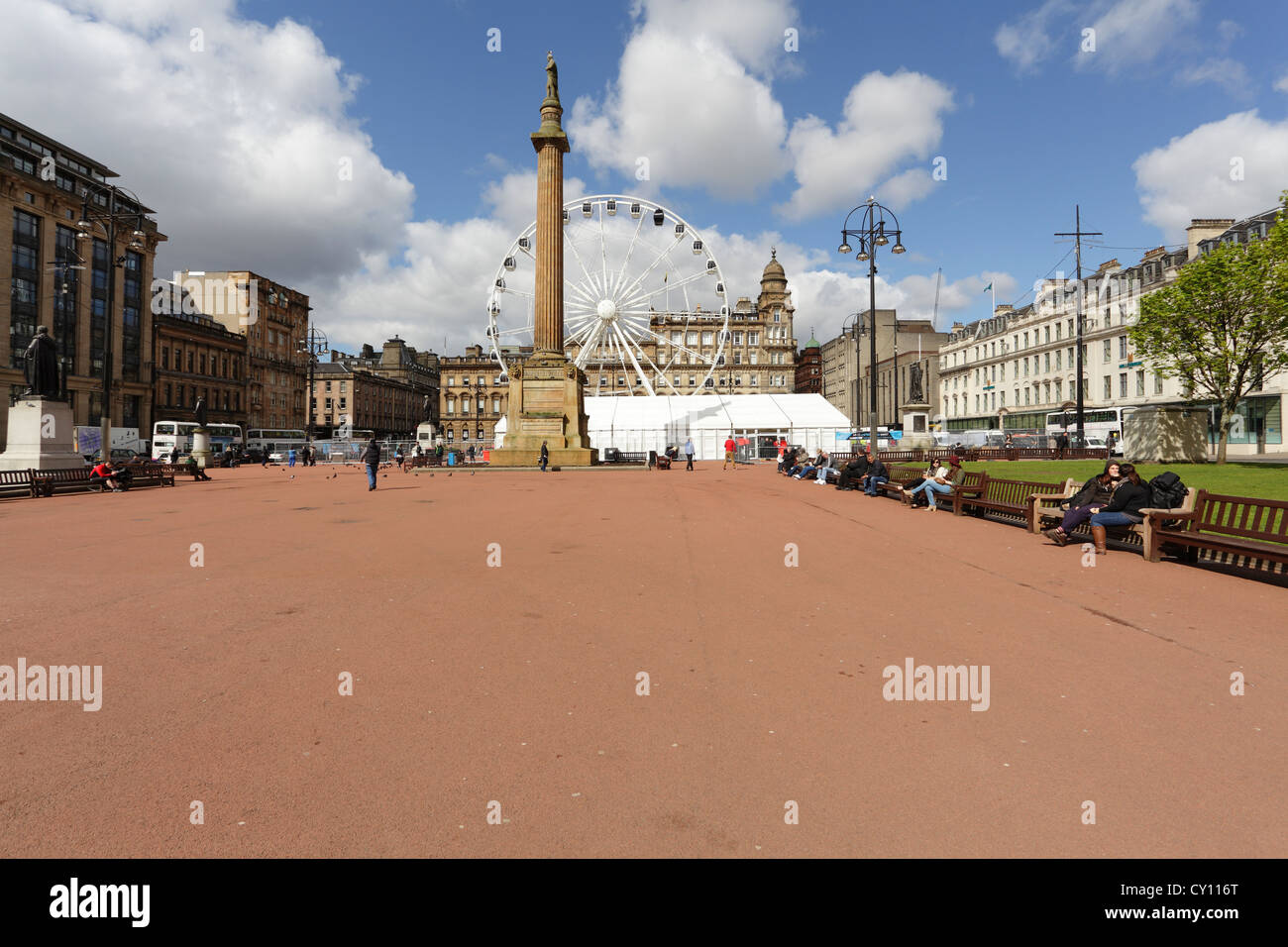 George Square with a temporary R40 Observation Wheel and old red tarmac surface in Glasgow city centre, Scotland, UK Stock Photo
