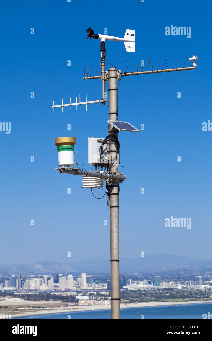 R.M. Young Marine Wind Monitor atop mast with radio relay equipment Stock Photo
