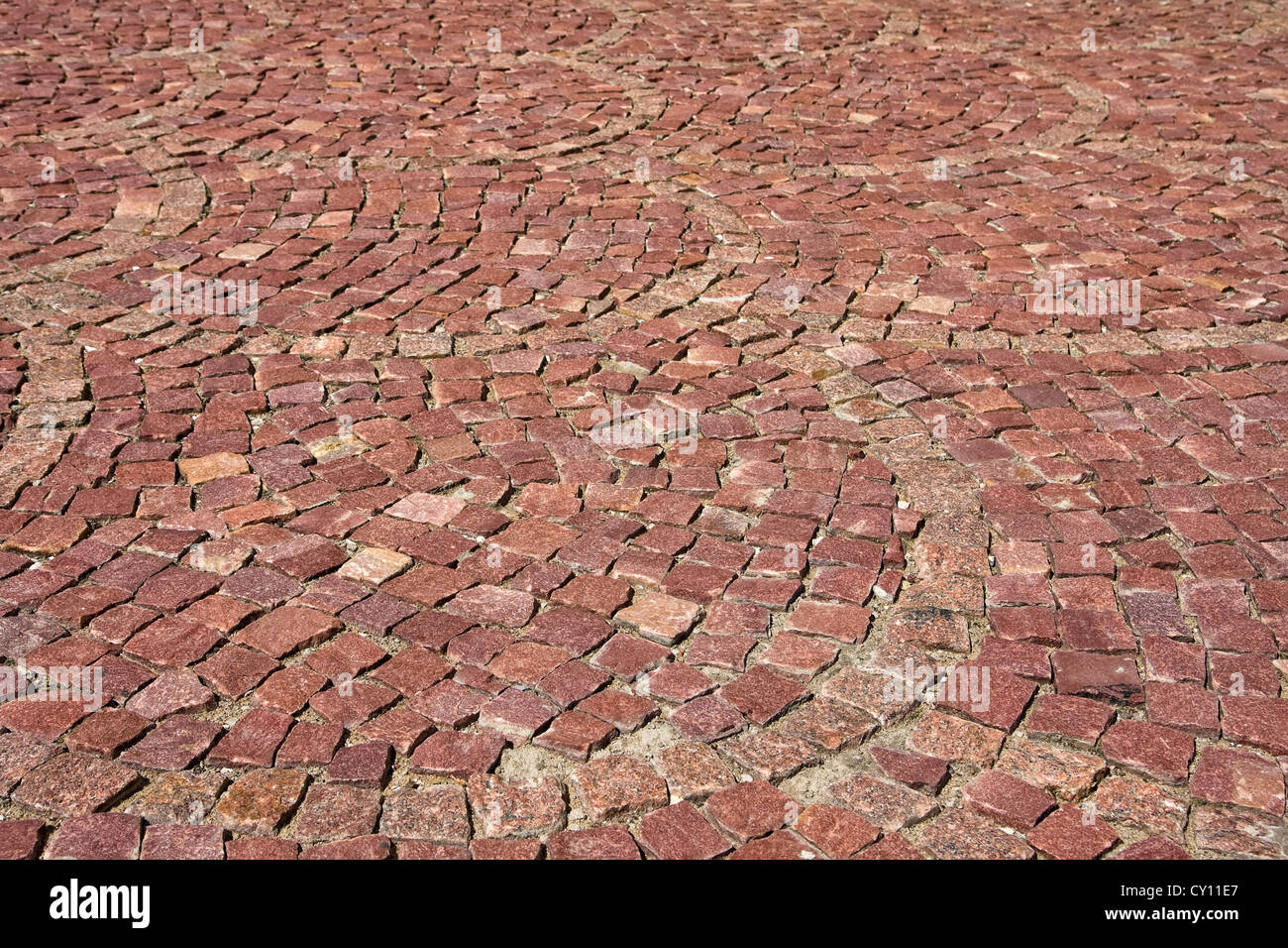 Cobblestone road background Stock Photo - Alamy