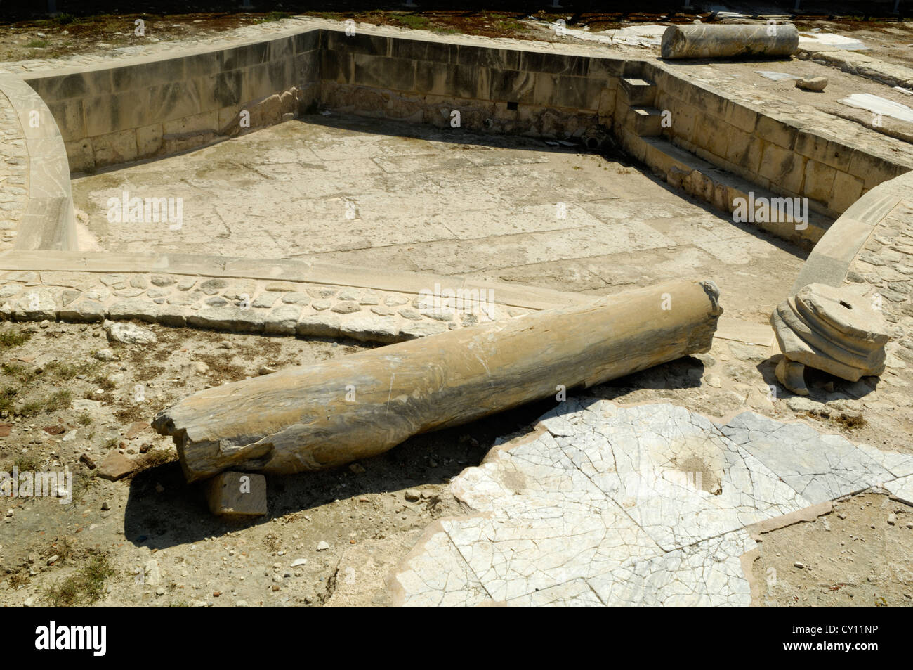 Hexagonal Roman frigidarium (cold bath) in public baths, 9.25m diameter, 1.5m depth, Kourion ancient Roman site Stock Photo