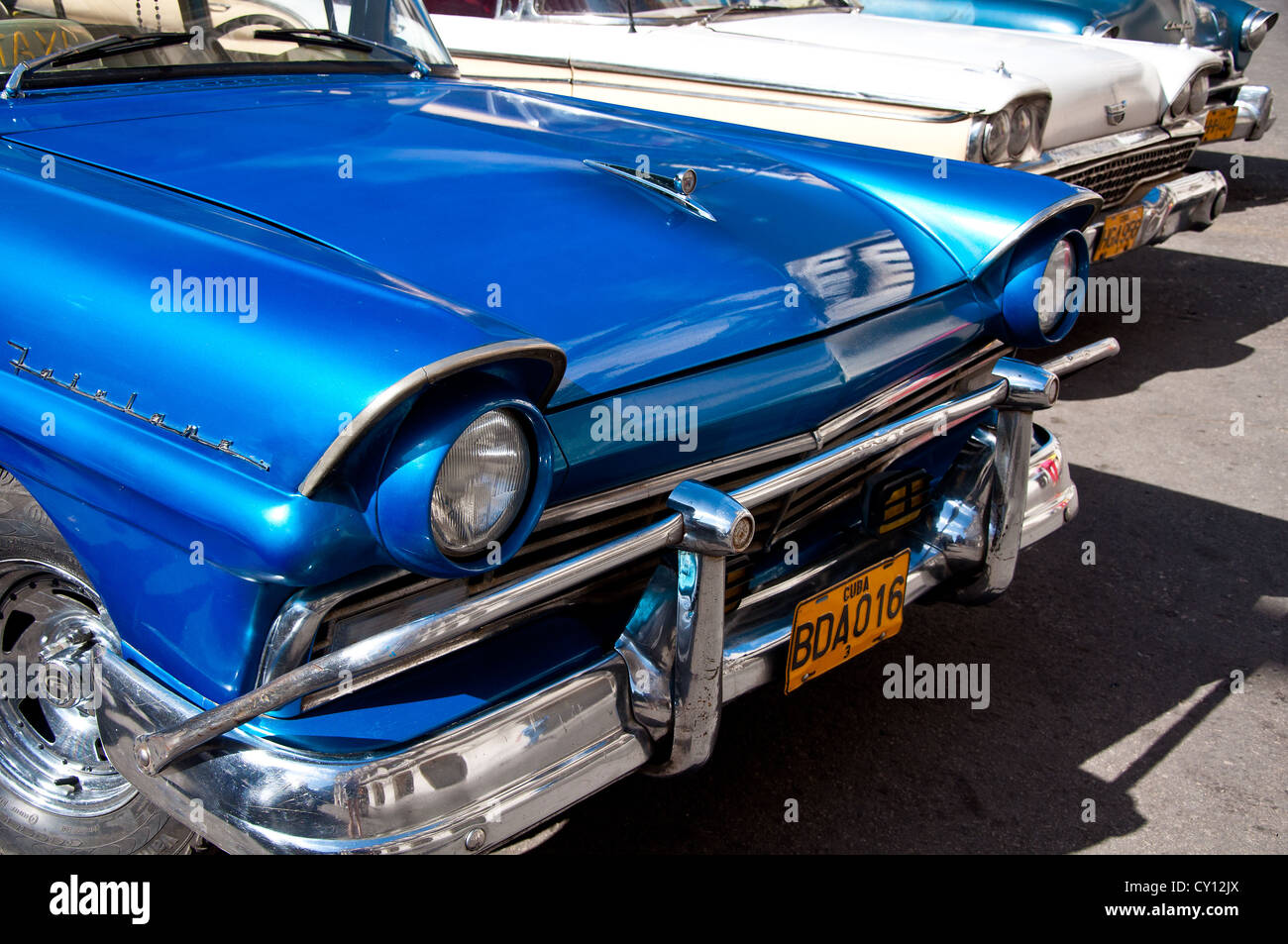 Blue and white vintage cars in La Havana, Cuba near the Parque Central Stock Photo