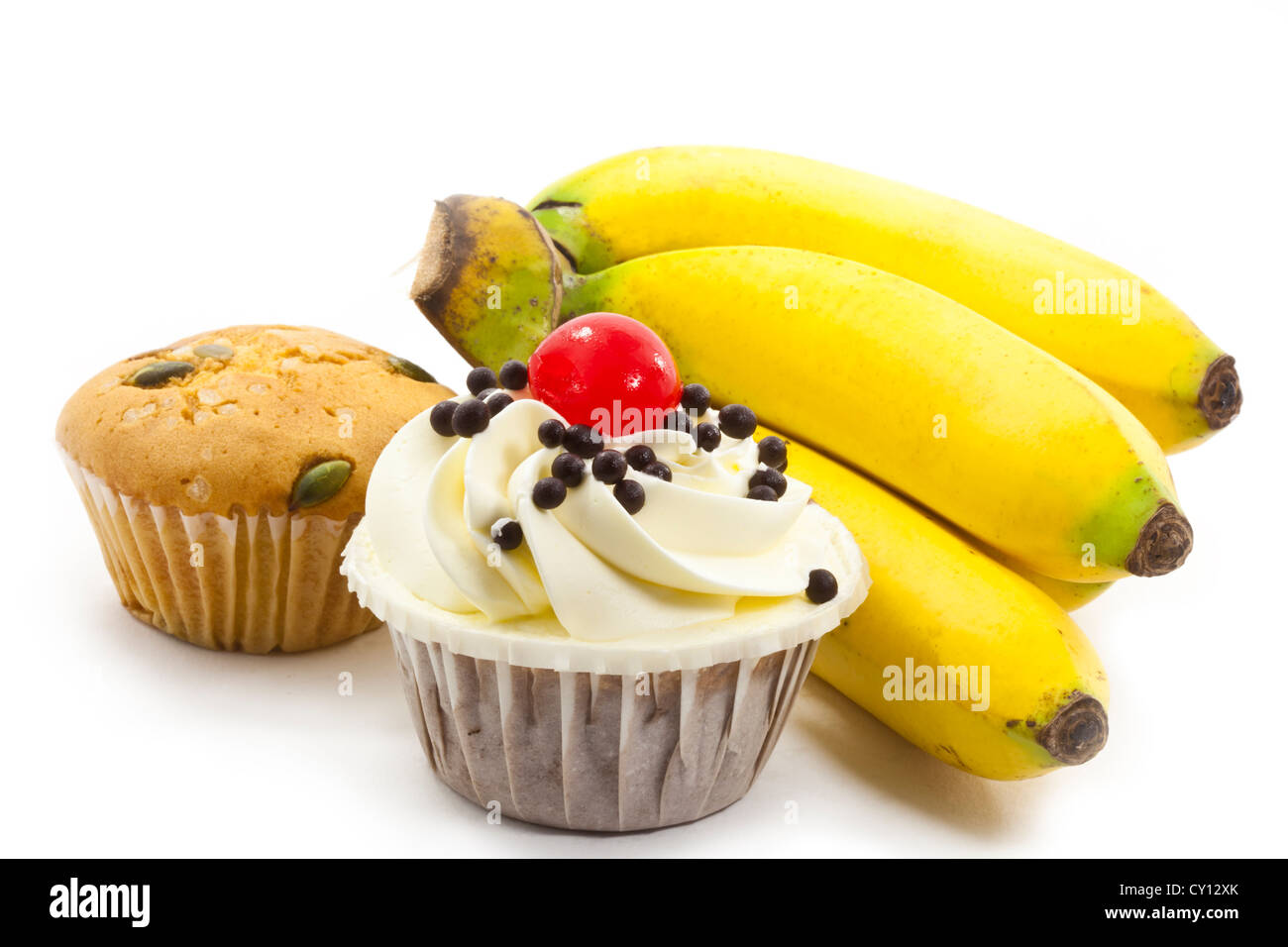 cup cake and bunch of bananas Stock Photo Alamy