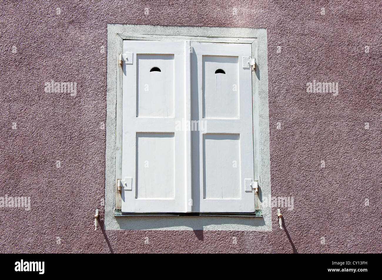 Typical old German window with closed wooden shutters Stock Photo Alamy