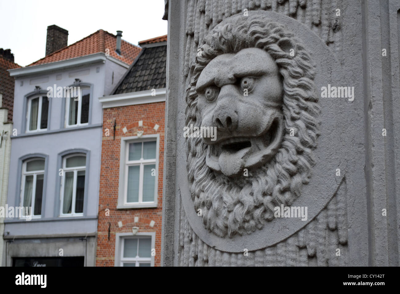 Lion stonework detail, Sint-Jansplein street, Brugge / Bruges, Belgium. Stock Photo
