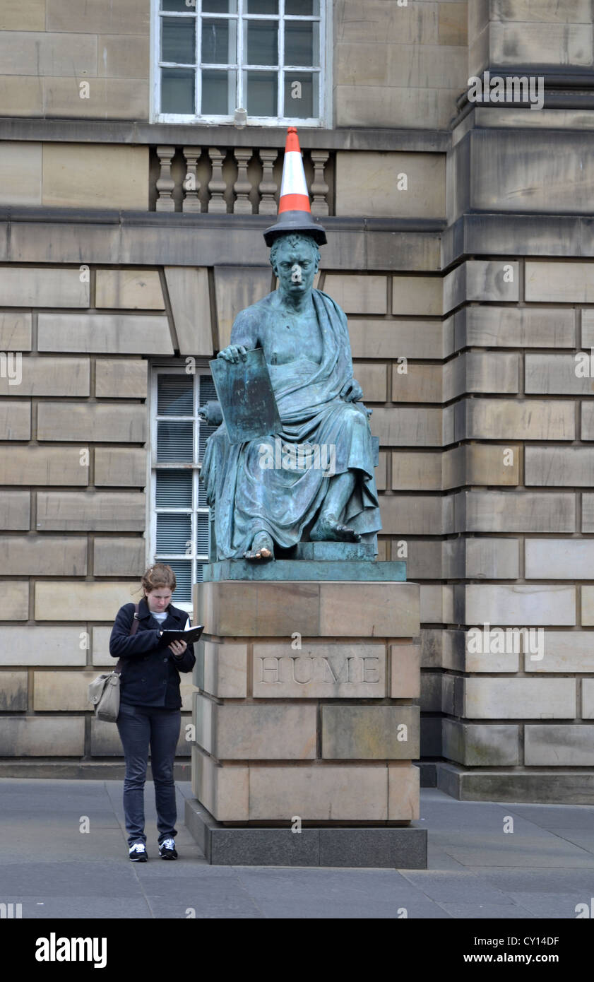 Statue, Royal Mile, Edinburgh Fringe Festival, Scotland. Traffic cone on statue  - silly sights are common at this festival. Stock Photo