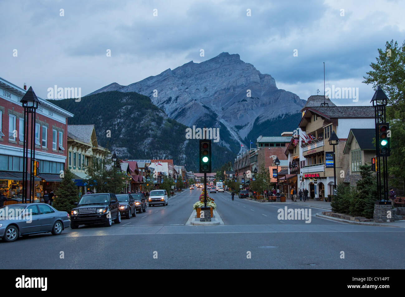 Banff Avenue in resort town of Banff in the Canadian Rocky Mountains located in the Banff National Park in Alberta, Canada. Stock Photo