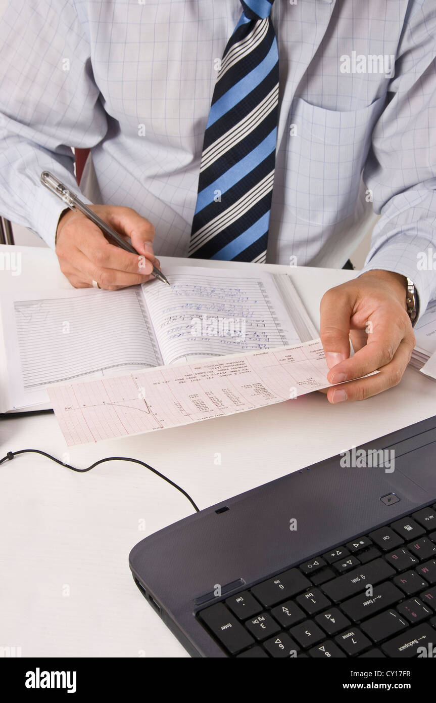 Professional clinical research monitor at working place. Stock Photo