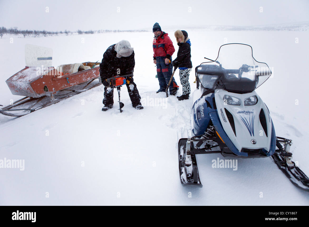 ice fishing in Finland Stock Photo - Alamy