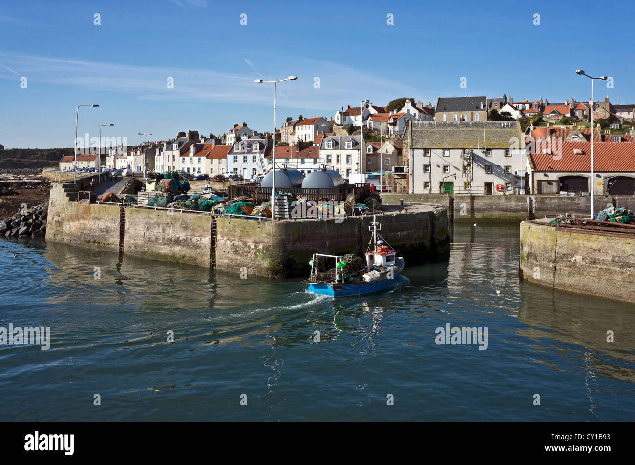 Fishing boat returning from fishing and entering Pittenweem Harbour in ...