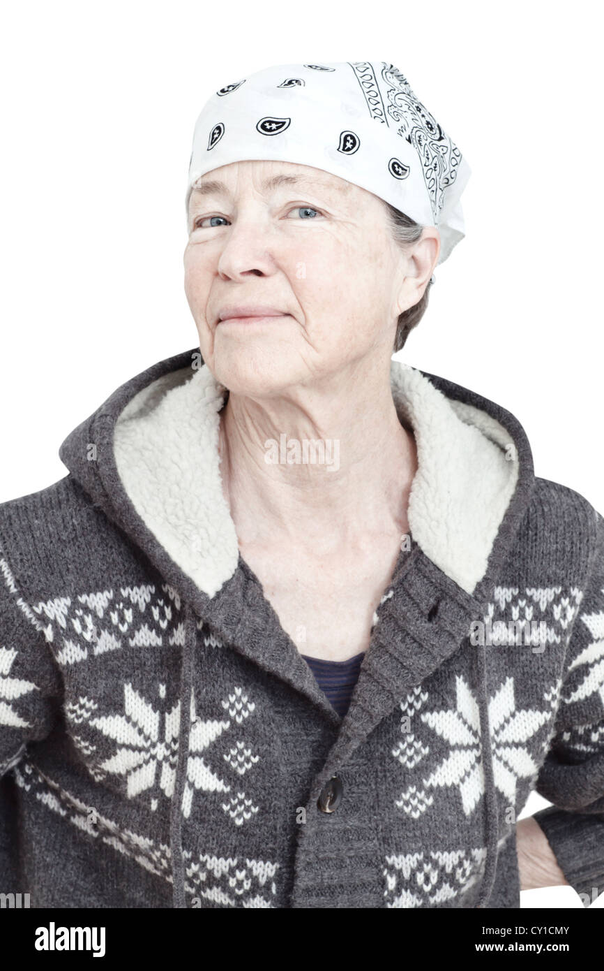 Senior woman in winter clothing and wearing headscarf, portrait. Stock Photo