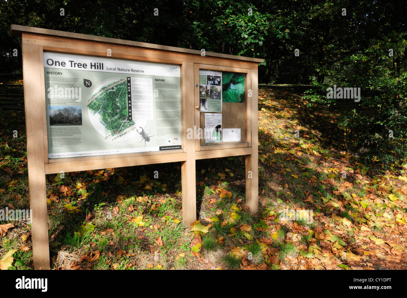 An interpretative sign on One Tree Hill local nature reserve in South London. Stock Photo