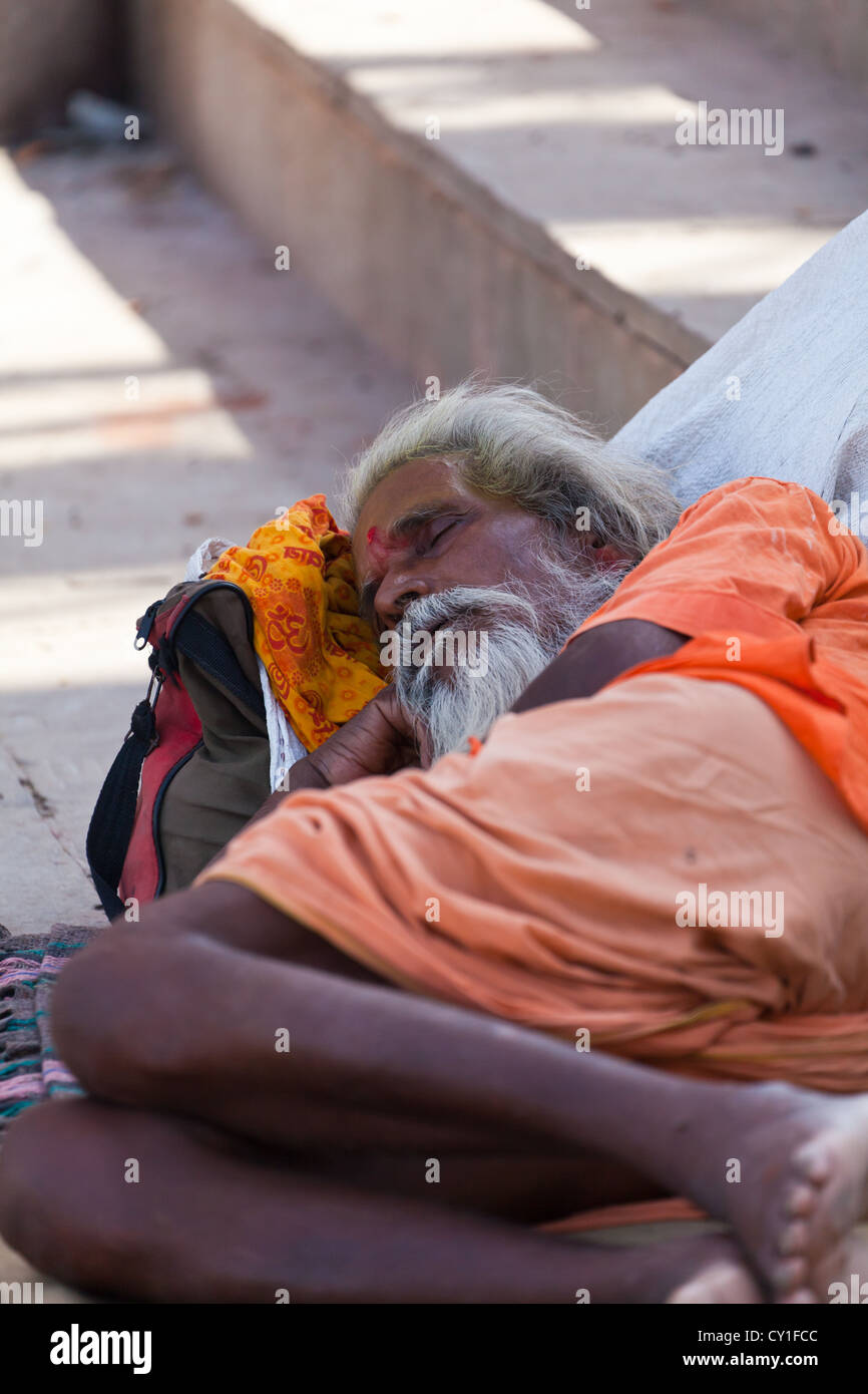 Sleeping on the Stairways at the Ghats in Varanasi, India Stock Photo