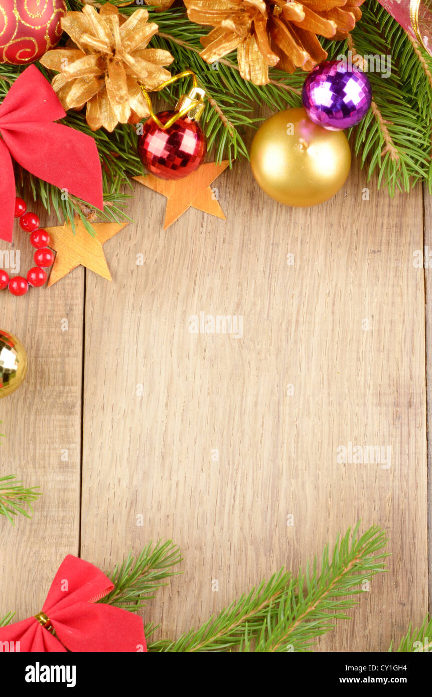 Christmas background with balls and decorations over wooden table Stock Photo