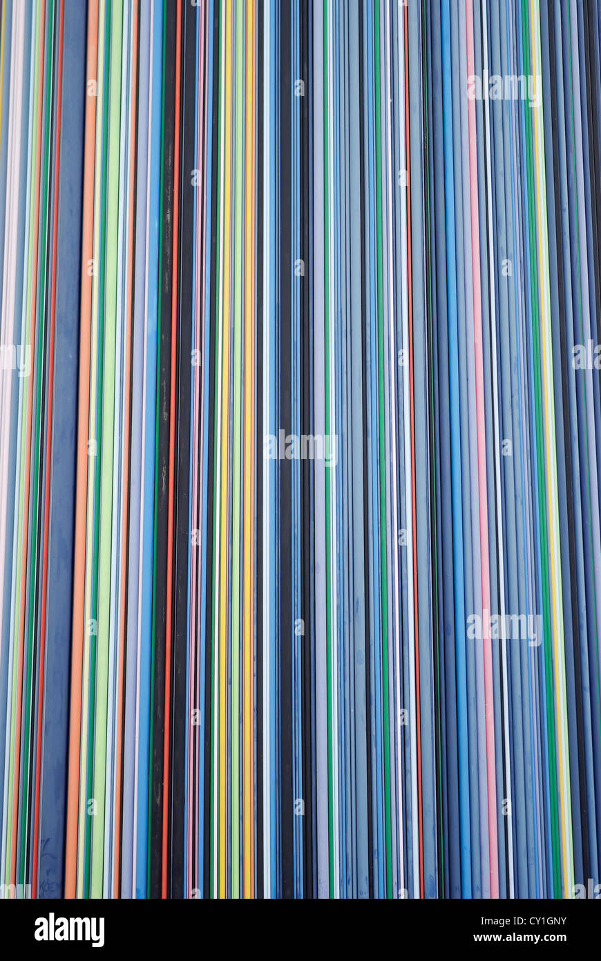 Close up of multicoloured stripes covering object at the Esplanade du General de Gaulle, La Defense, Paris, France Stock Photo